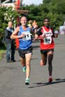Ian Hudspith (Morpeth) and Tadele Geremew (Elswick)  during the Tyne Bridge Harriers Exhibition Park 5k, Newcastle.